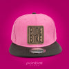 GORRA PLANA RIDE BIKE ROSA Y NEGRA